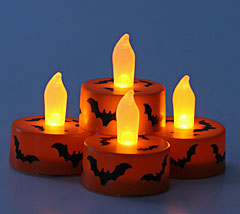 Set of 4 Flameless Tealights Orange with Black Bats